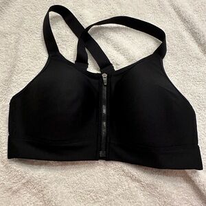 Under armour black zip front sports bra. Medium.